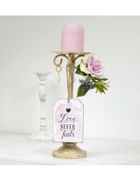 Plaque à suspendre Love Never Fails